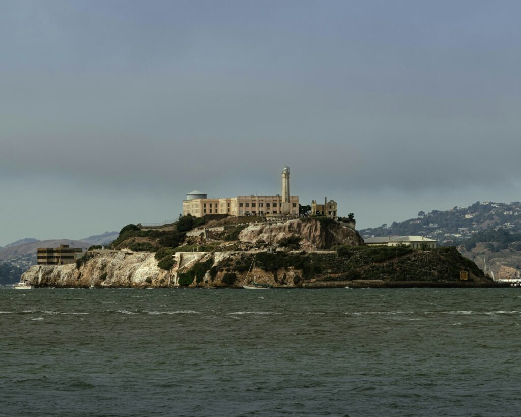 Alcatraz Island under a grey sky over the bay